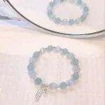 925 Sterling Silver Aquamarine Cat's Eye Healing Feather Star Charm Bracelet - Image 2