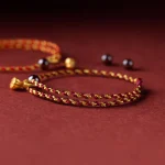 Handcrafted Red Gold Rope Lotus Peace And Joy Charm Braid Bracelet - Image 11
