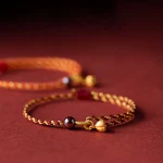 Handcrafted Red Gold Rope Lotus Peace And Joy Charm Braid Bracelet - Image 3