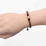 Tibetan Handmade Eight Thread Knot Copper Coin Luck Weave String Bracelet - Image 5