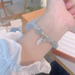 925 Sterling Silver Aquamarine Cat's Eye Healing Feather Star Charm Bracelet - Image 7
