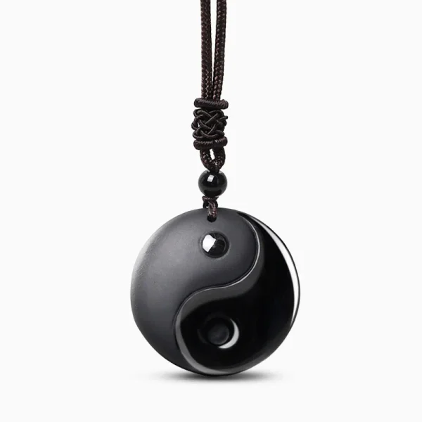 Black Obsidian Taoism Necklace Pendant with Yin Yang view 10, spiritual jewelry product photography on plain bac...