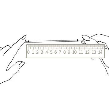 Lay marked paper strip flat and measure with a ruler for wrist circumference