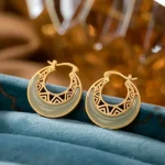 Gold openwork crescent earrings with green jade