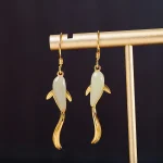 Koi fish dangle earrings with green jade body
