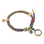 Multicolor Tibetan braided bracelet with prayer wheel and ghau charm