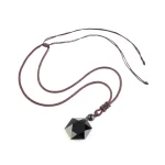 Full obsidian pendant necklace laid flat on a white background